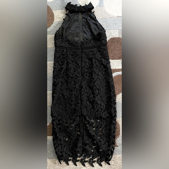 Revolve| Bardot Black Crochet Lace
Gemma Midi Halter Dress - Picture 7 of 8